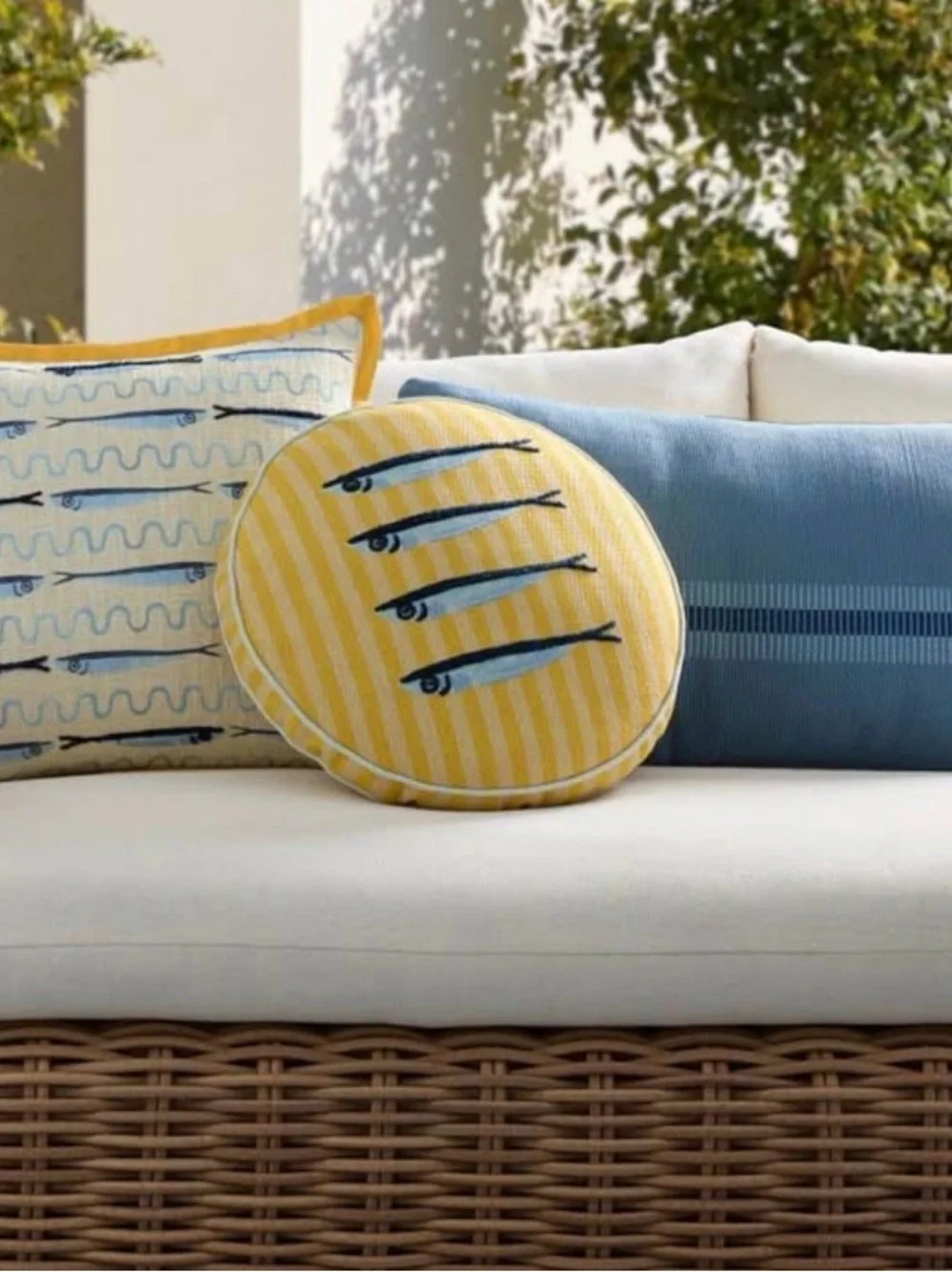 BRAND NEW West Elm Yellow Striped Round Pillow with Blue Sardine Motif